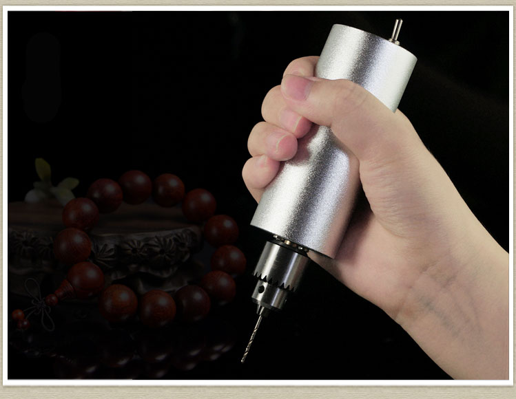 Small drill ,Jade, Man playing electric grinding, drilling, grinding, polishing, cutting, carving